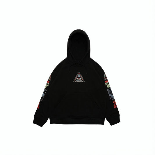 Black graphic hoodie with distressed light wash jeans and white sneakers.