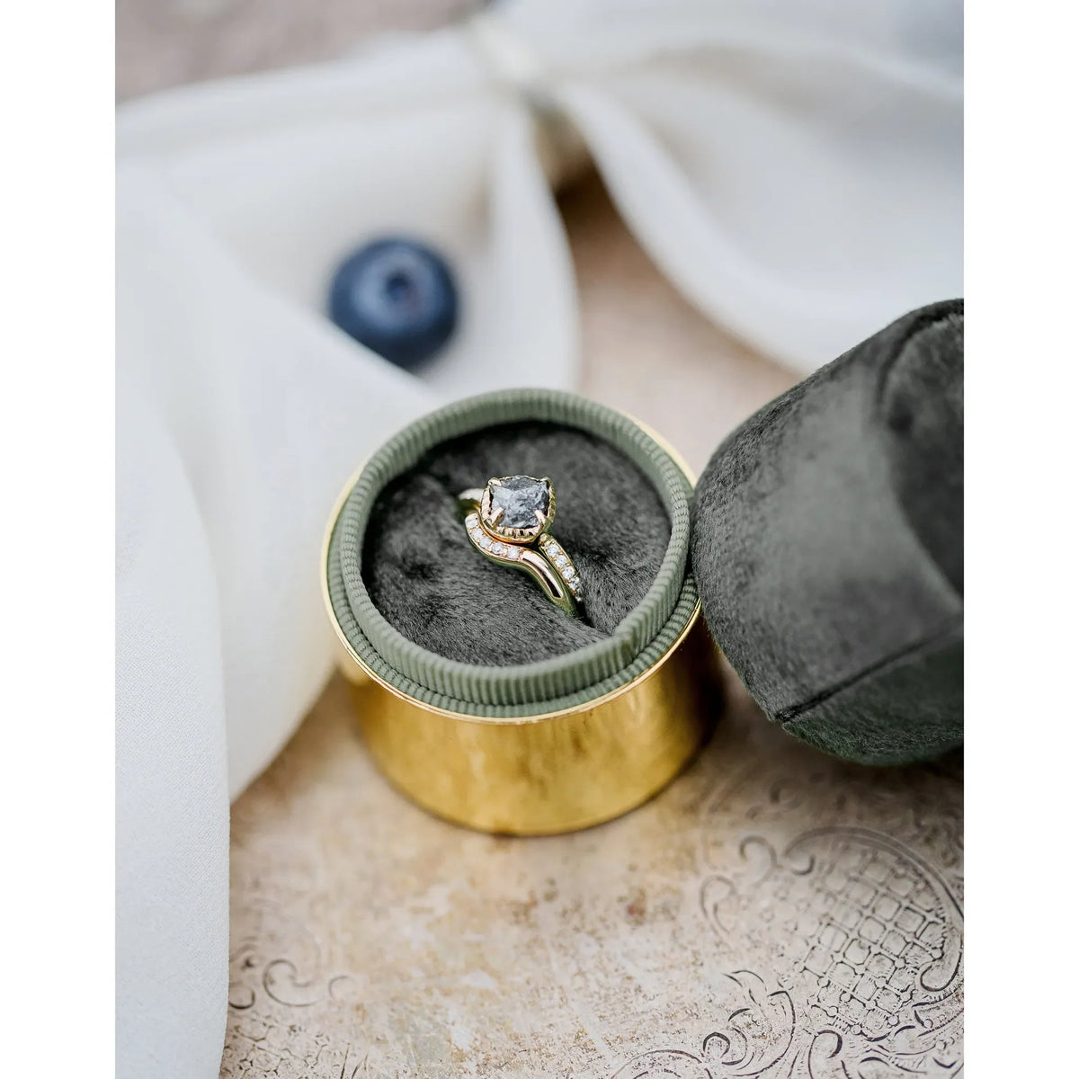 Gold ring with white diamonds, elegant design, perfect for special occasions.